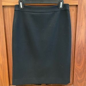 Black wool pencil skirt from J Crew. Perfect condition. Cute for the winter.